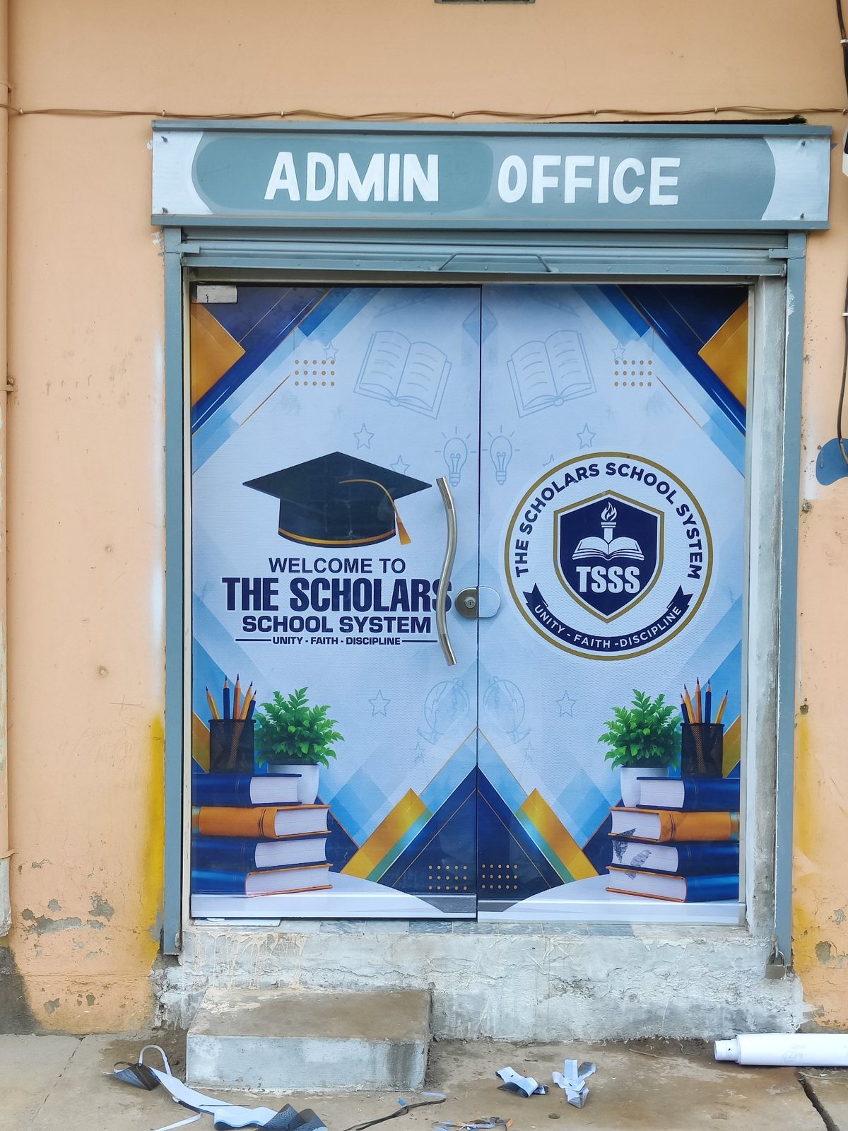 The Scholars School System admin office glass door with one way vision vinyl pasted by PRINT POINT